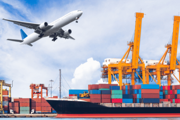 Cargo plane and ship representing air freight vs. ocean freight shipping options.