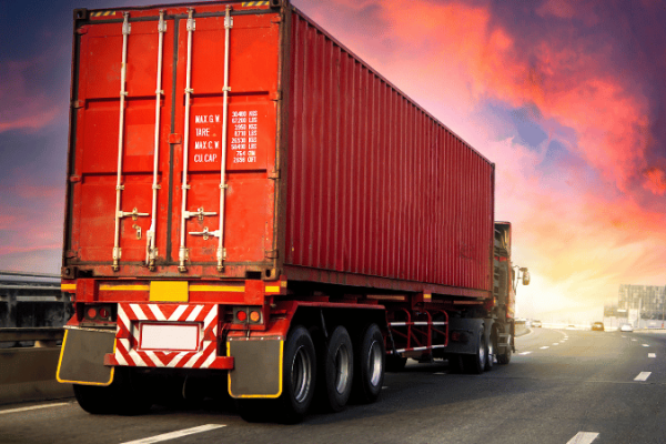 Trucks transporting shipments using FTL and LTL freight solutions.